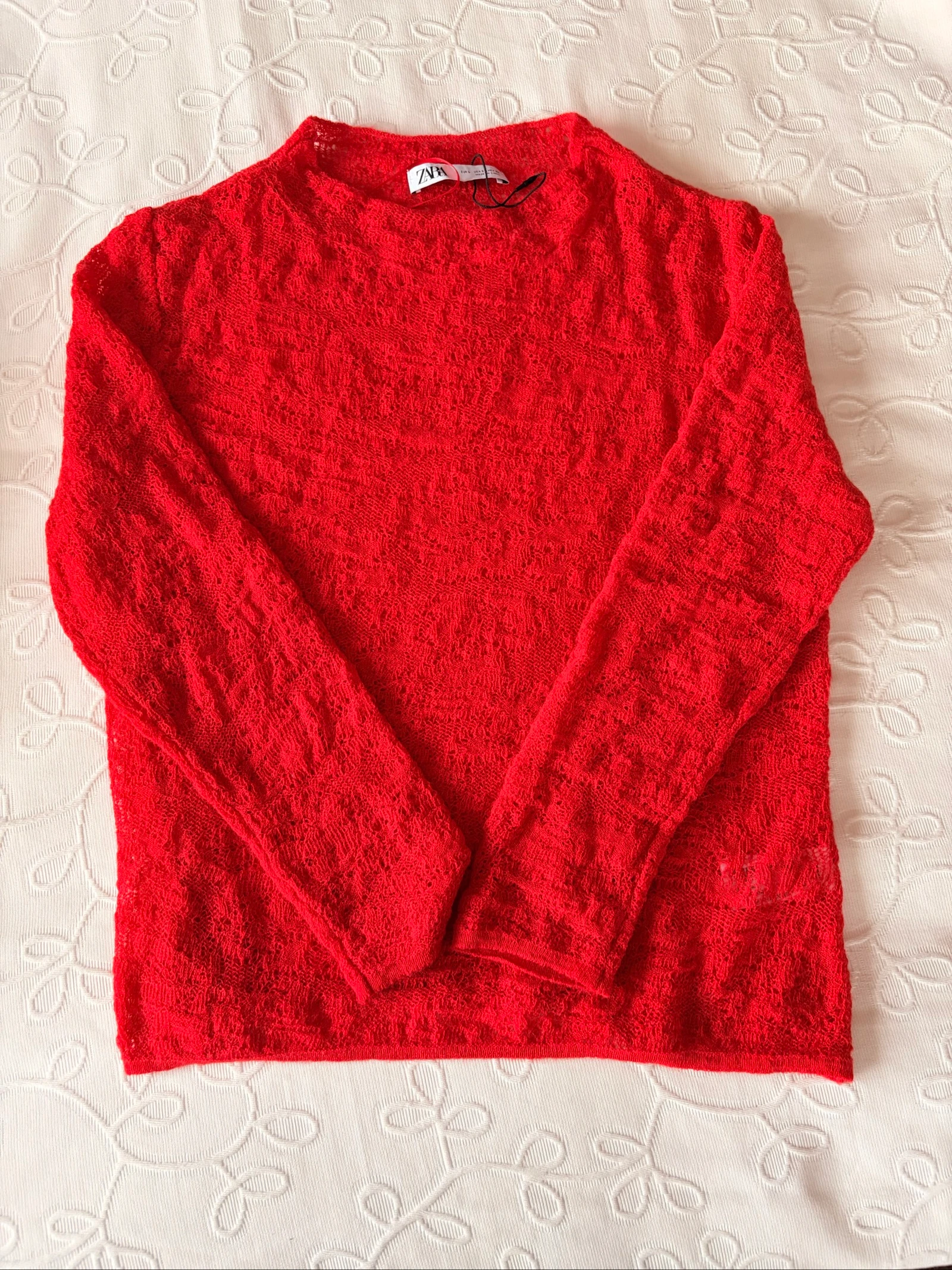 Jersey rojo de punto calado 